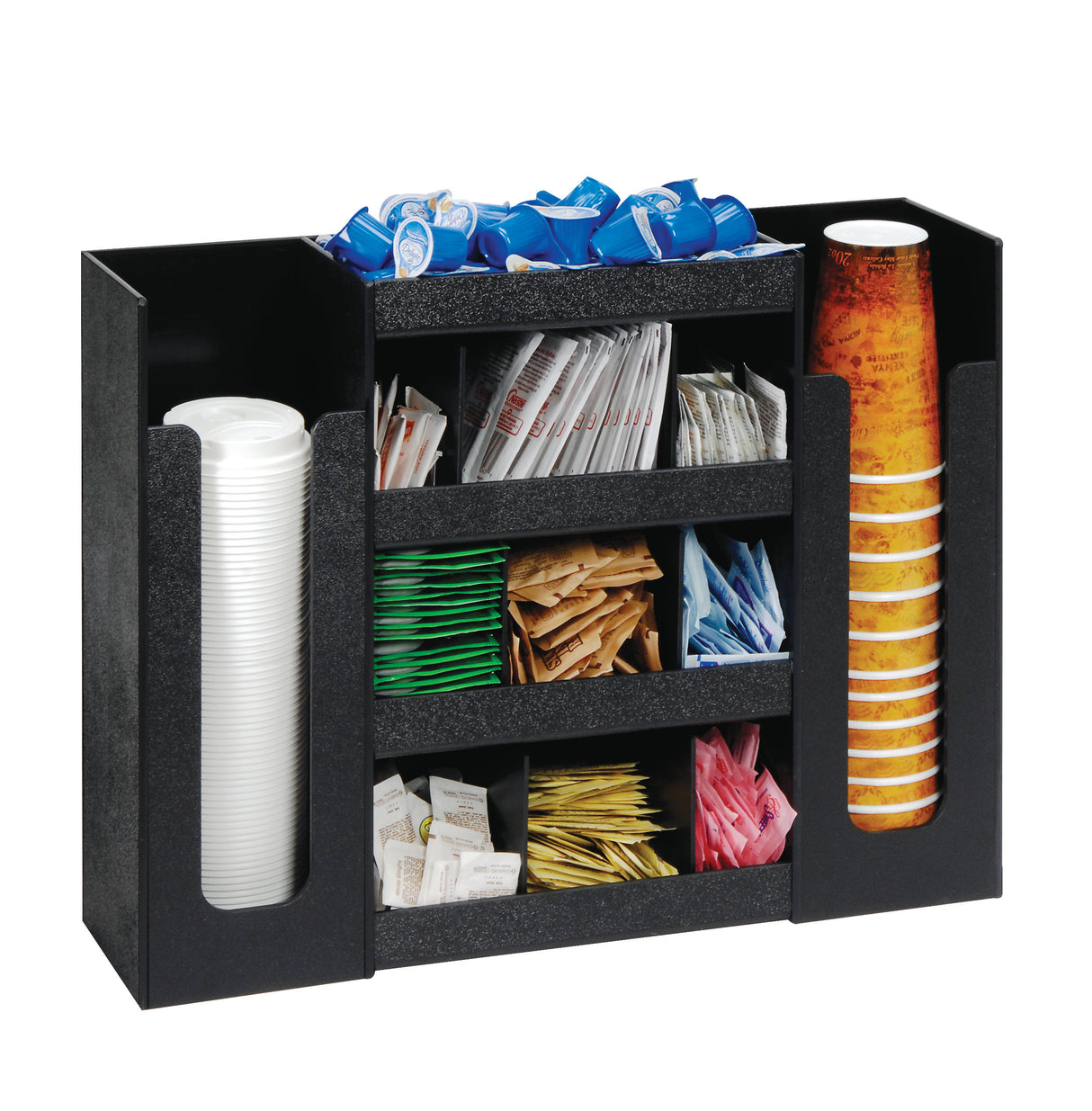 A black condiment organizer holds stacks of disposable cups on both sides, with coffee creamers, cup lids, and assorted sugar packets neatly arranged in the middle compartments—perfect for a streamlined Dispense-Rite setup.