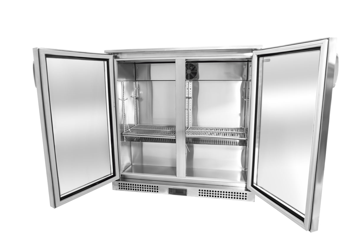 A stainless steel bar cooler with both doors open reveals empty shelves and an interior fan. The inside is clean and spacious, with metal racks and a digital control panel at the bottom. This Refrigerated Back Bar Cooler stands on adjustable feet against a white background.