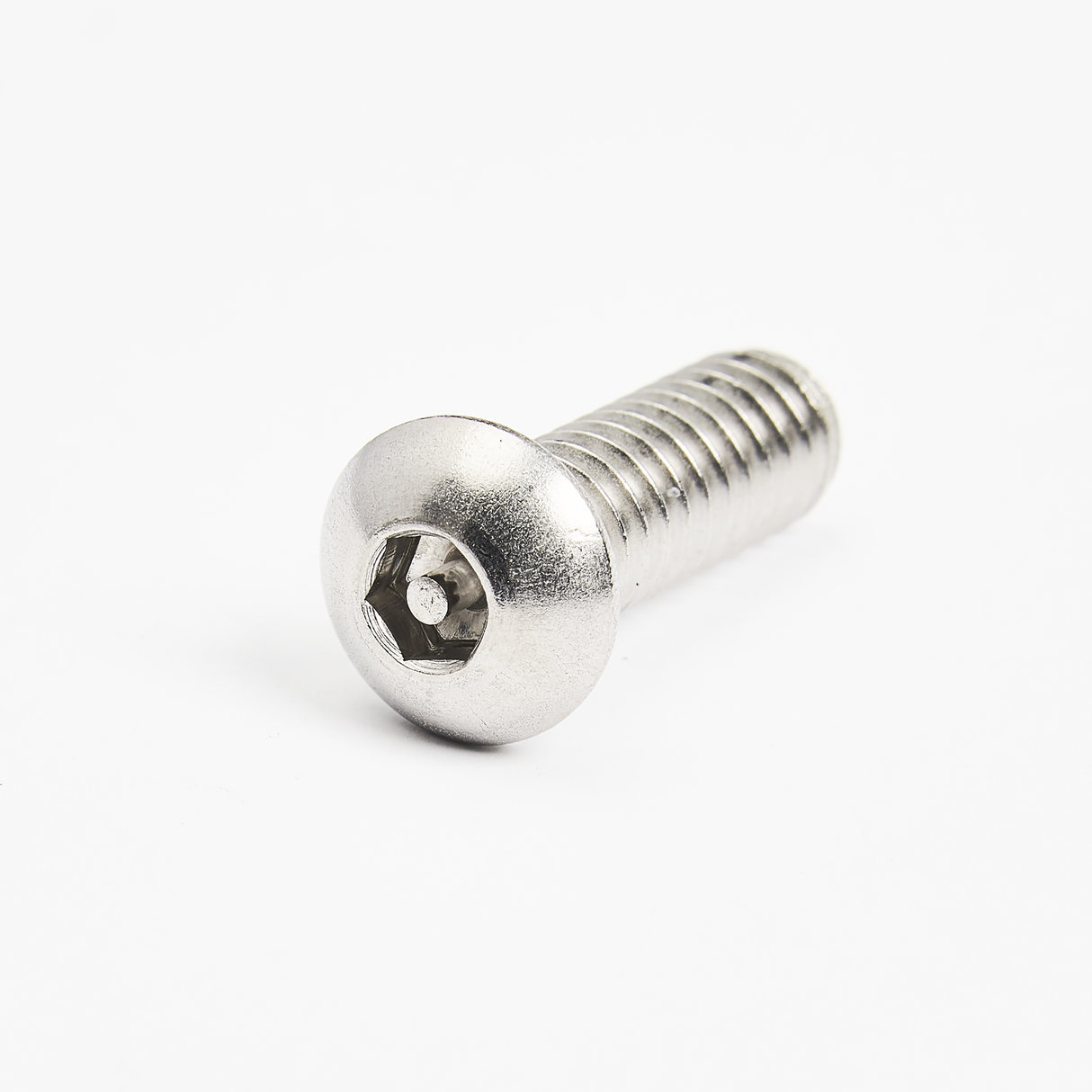 A shiny, silver metal screw with a rounded head and internal hexagonal (Allen) socket lies on a white surface. Commonly used in assembling commercial dishwasher units, the fully threaded shaft appears clean and unused.