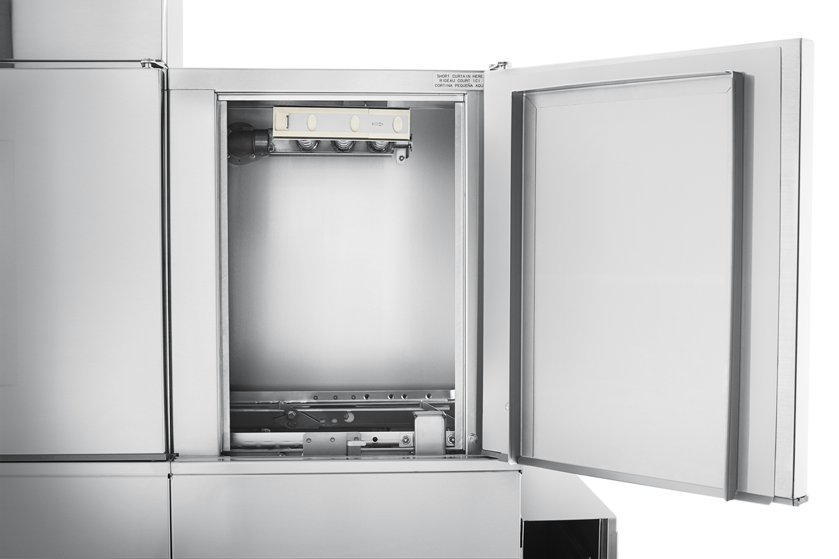 A stainless steel ice maker with its door open reveals the inner compartment and ice-making mechanism at the top, reminiscent of a conveyor dishwashers clean, modern design. The metallic exterior and interior are spotless against a white background.