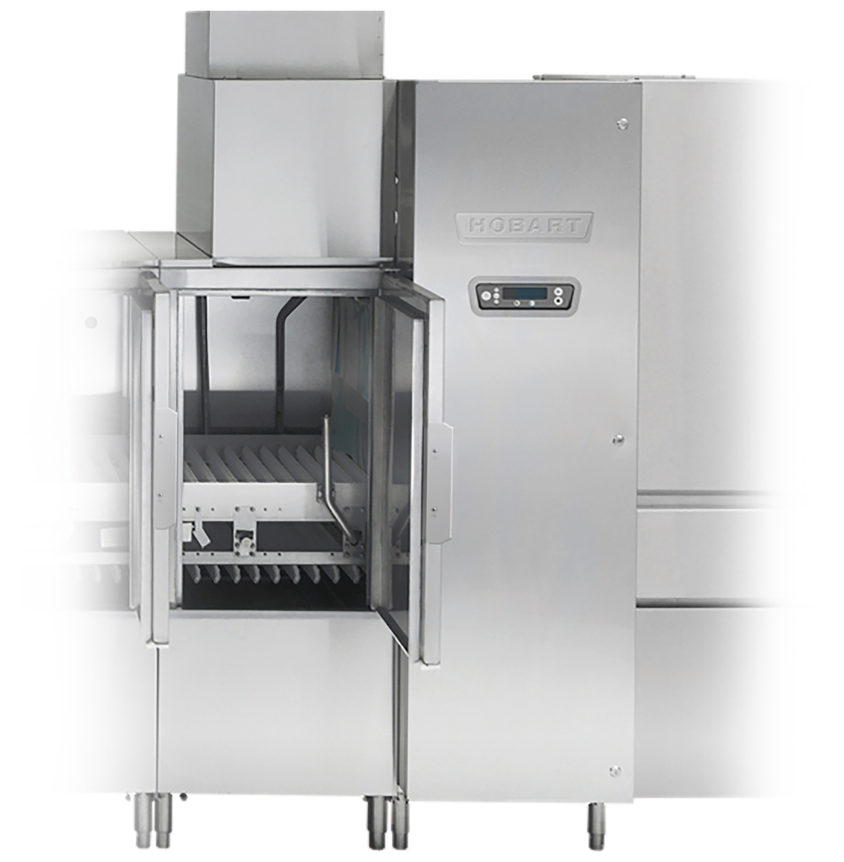 A commercial stainless steel dishwasher with an open front door reveals interior racks for dishes. The unit features a digital control panel labeled “HOBART,” stands on four metal legs, and includes an automatic soil removal system. The background is white and faded at the edges.