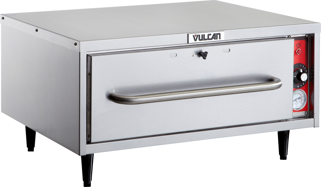 A stainless steel countertop pizza oven with black legs, a large horizontal handle, and the Vulcan brand on the front. The right-side control panel features thermostat controls and a temperature gauge set against a red background.