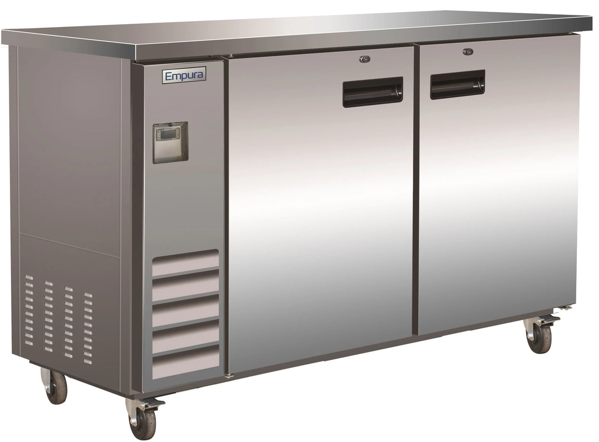 A stainless steel Empura refrigeration unit with two doors and a top workspace. This back bar cooler sits on four caster wheels, features black handles, a lower-left vent, digital display above the vent, and an Empura label on the upper left door.