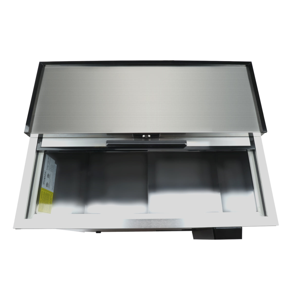 A stainless steel outdoor kitchen countertop with an open lid reveals a built-in Empura refrigeration bottle cooler. The empty interior is divided into three sections, with a yellow warning label on the left. The photo is taken from above on a white background.