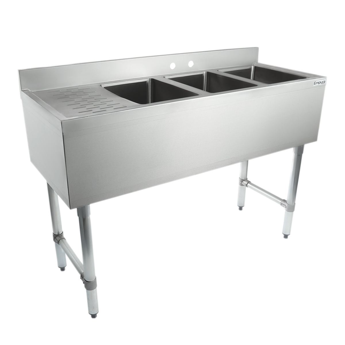 A commercial 3 compartment stainless steel sink with deep rectangular basins and a raised back panel, supported by sturdy legs. The left side features a built-in drainboard, making this underbar sink ideal for heavy-duty kitchen or industrial use.
