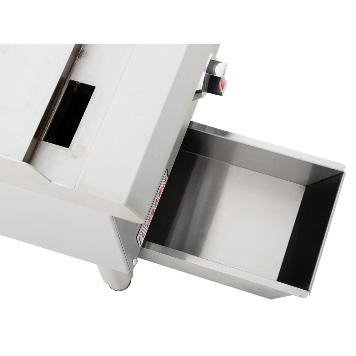 A close-up view of a heavy duty gas griddle with a stainless steel finish and a pull-out rectangular tray. The tray is partially open, revealing a smooth metallic interior. A control knob and slot are set above it, all against a plain white background.