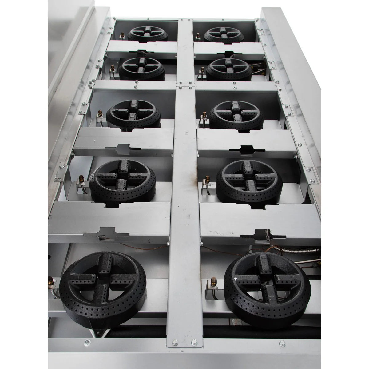 A close-up view of the interior of a double base gas range, featuring eight black circular gas burner heads in two rows within a metallic silver frame—a prime example of reliable commercial kitchen equipment.