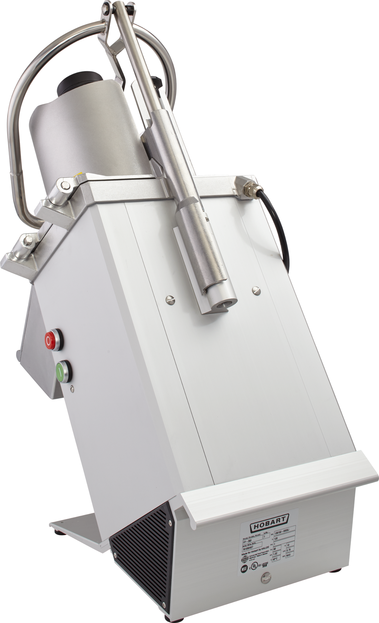 A commercial Hobart food processor with a tilted stainless steel body, large cylindrical feed tube for continuous feed, pusher handle on top, and red and green control buttons. The machine has a label on the front and stands on a metal base.