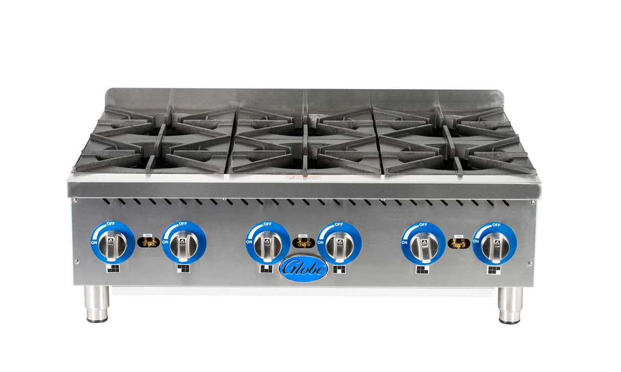 The Globe GHP36G gas countertop hotplate features six burners with metal grates, a stainless steel body, and blue on/off knobs. The "Globe" brand name is centered below the controls, making this 6 burner hotplate ideal for commercial kitchens.