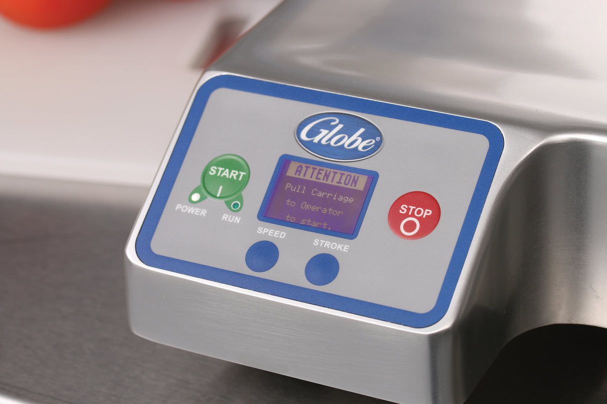 Close-up of a Globe premium heavy duty slicer control panel on a stainless steel machine. The panel features green START and red STOP buttons, a digital display, and blue SPEED and STROKE controls for the 13 inch steel knife automatic slicer.