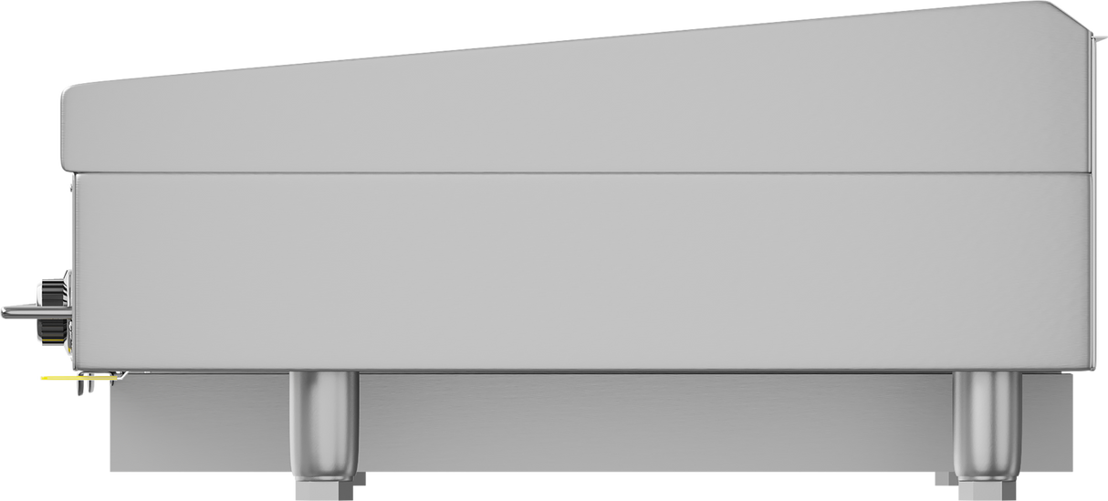 Side view of a large, industrial stainless steel Vulcan 972RX countertop gas griddle with a sloped top. This heavy duty griddle stands on four sturdy cylindrical legs, featuring a control knob and small yellow lever on the left side. The design is sleek and modern.