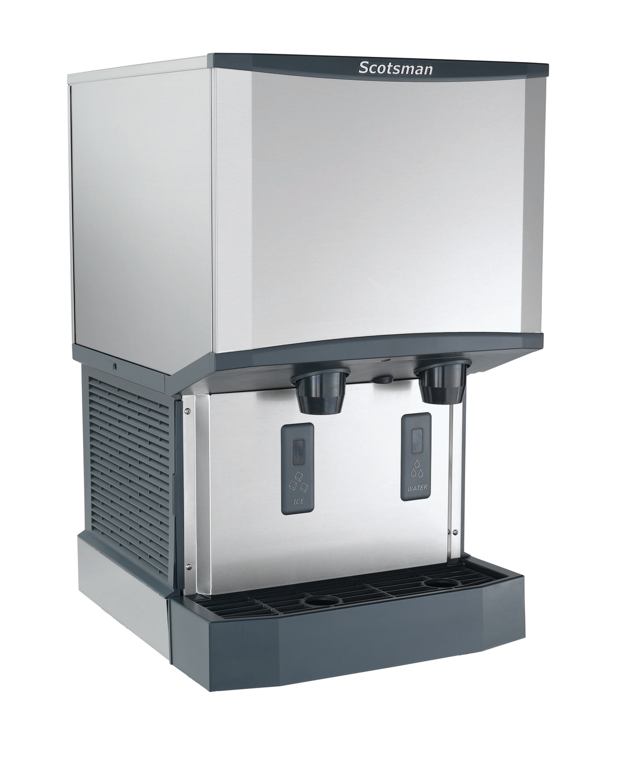 A stainless steel Scotsman ice and water dispenser with a boxy design, two black dispensing nozzles, touchfree infrared dispensing, touchscreen controls labeled “ice” and “water,” plus a black drip tray. The side panels feature ventilation grilles.