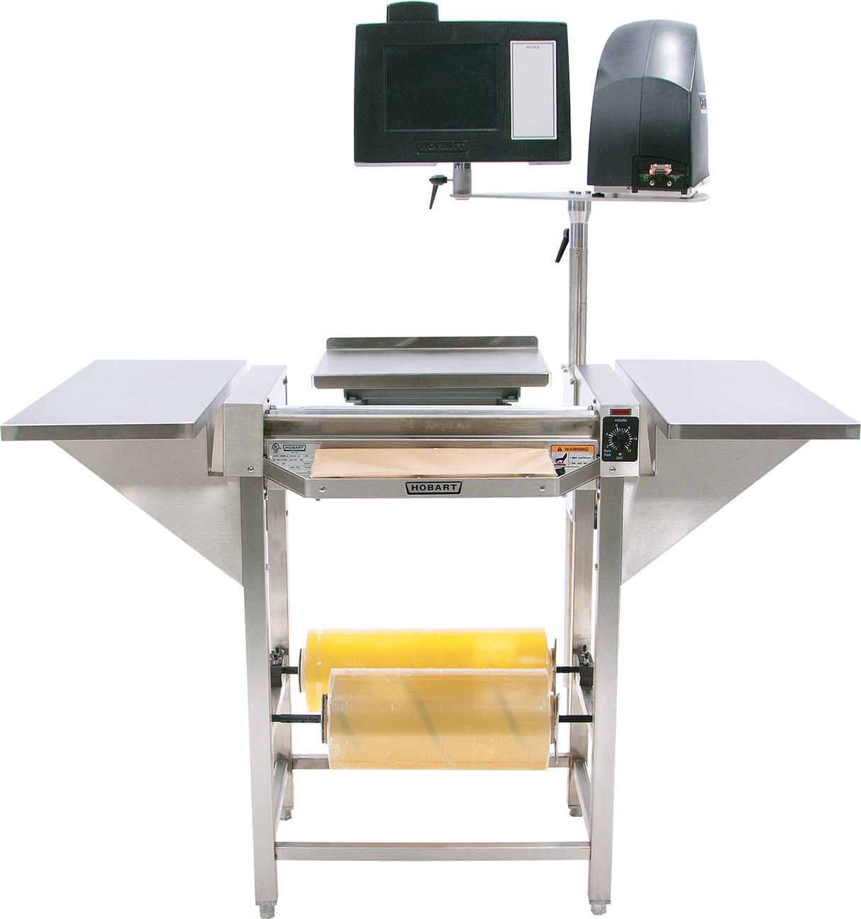 The Hobart Hand Wrap Station features 20 film capacity, two side tables, a digital scale with display screen, a back-mounted label printer, and two large rolls of yellow plastic wrap stored beneath the stainless steel central table.