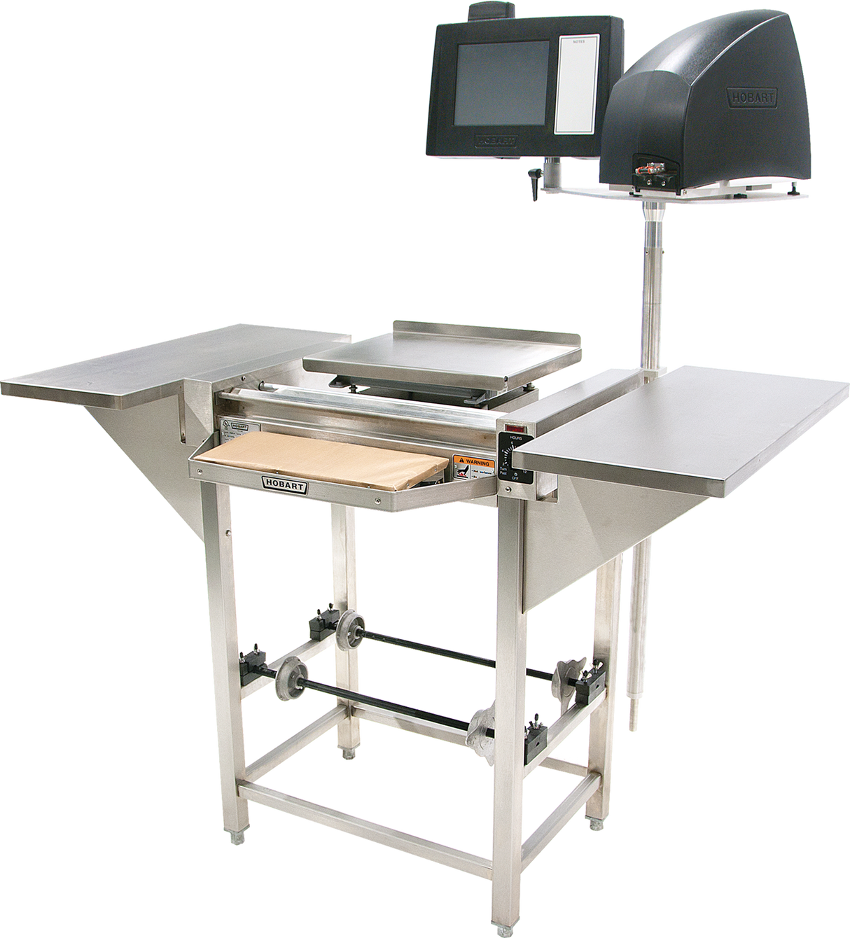 A Hobart stainless steel commercial food slicer with a 20 film capacity and attached touchscreen control panel. The Hand Wrap Station features flat work surfaces, a drawer beneath the slicing area, and metal frame legs with rollers and support bars.