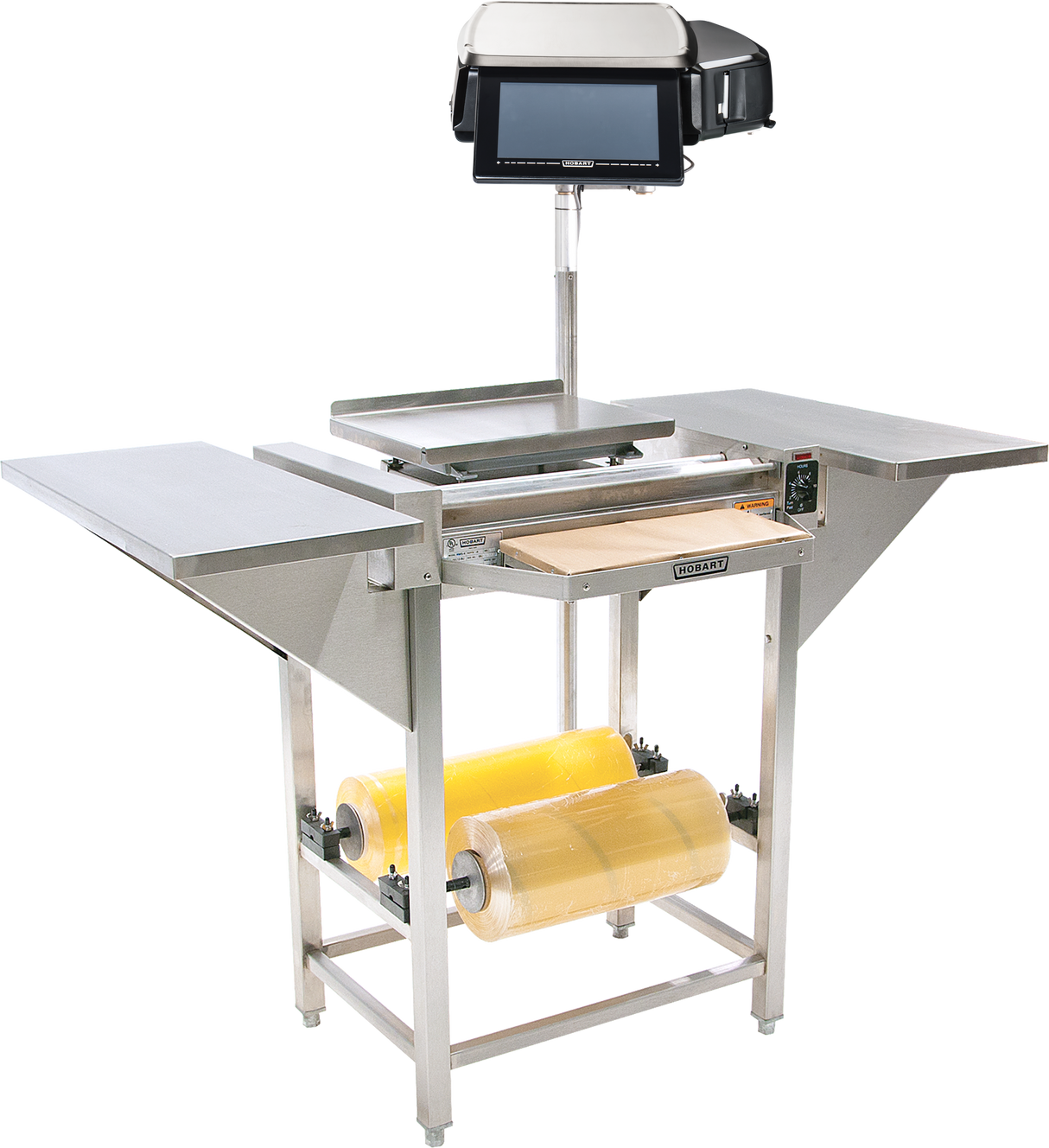 The Hobart Hand Wrap Station features a 20 film capacity, stainless steel build, digital scale, and touchscreen display. Two large rolls of clear plastic wrap are mounted below, with side shelves and a heated center plate for sealing packages.