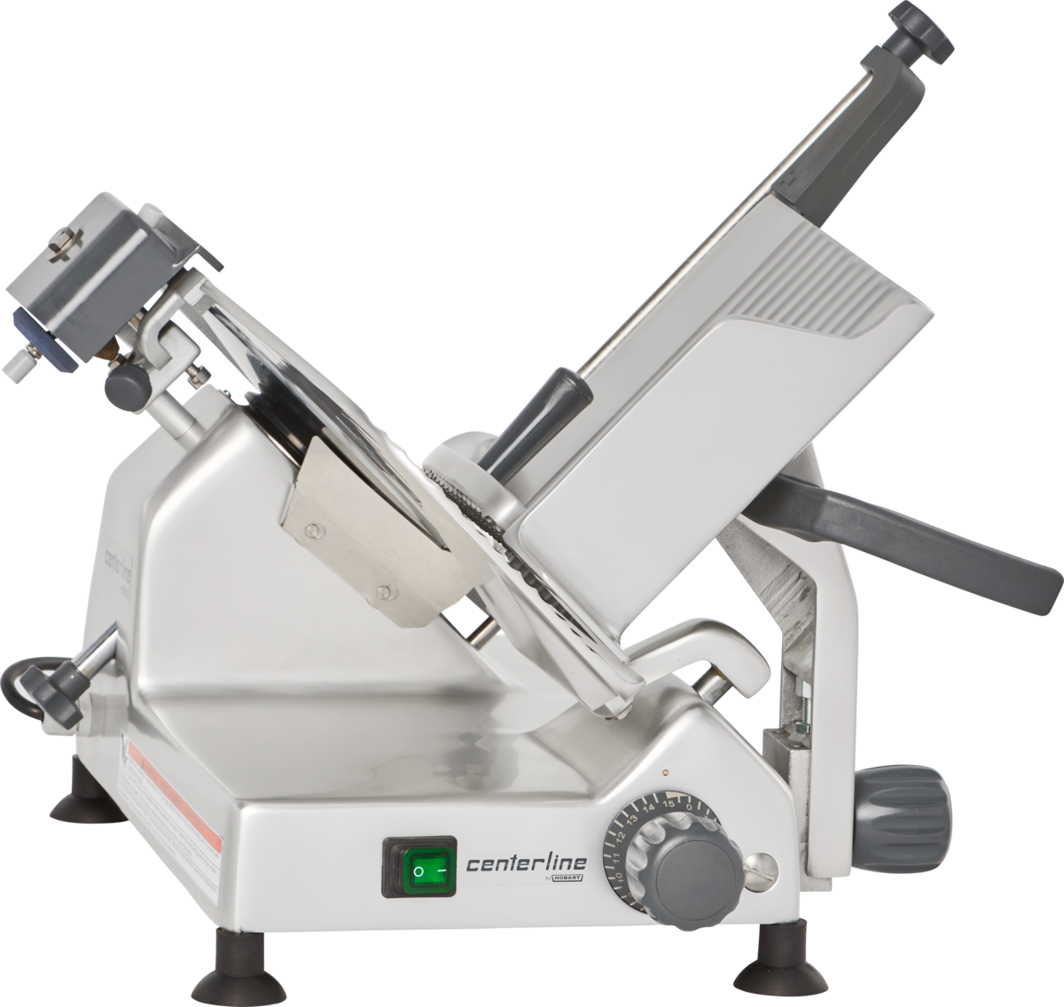 A commercial manual meat slicer made of stainless steel, shown in profile. Featuring a 12 carbon steel knife, adjustable thickness dial, green power switch, food carriage with handle, and legs for stability. The slicer is labeled “centerline.”.