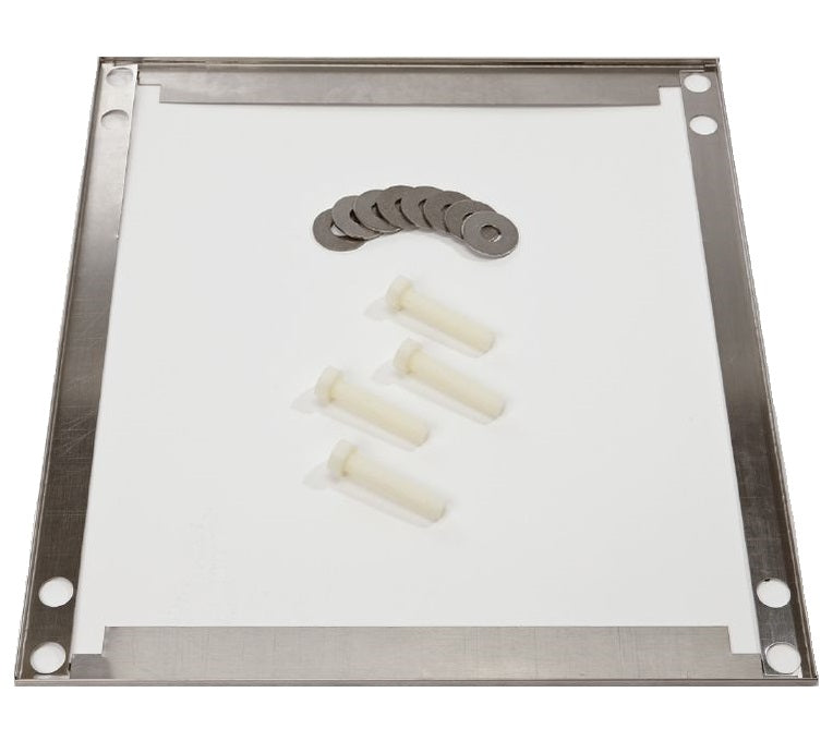 A metal plate with four corner holes lies on a white surface. Centered are four white cylindrical spacers—part of a Scotsman Undercounter Floor Mount Kit—and a row of ten metal washers in an arc above the spacers, suited for ADA countertops.