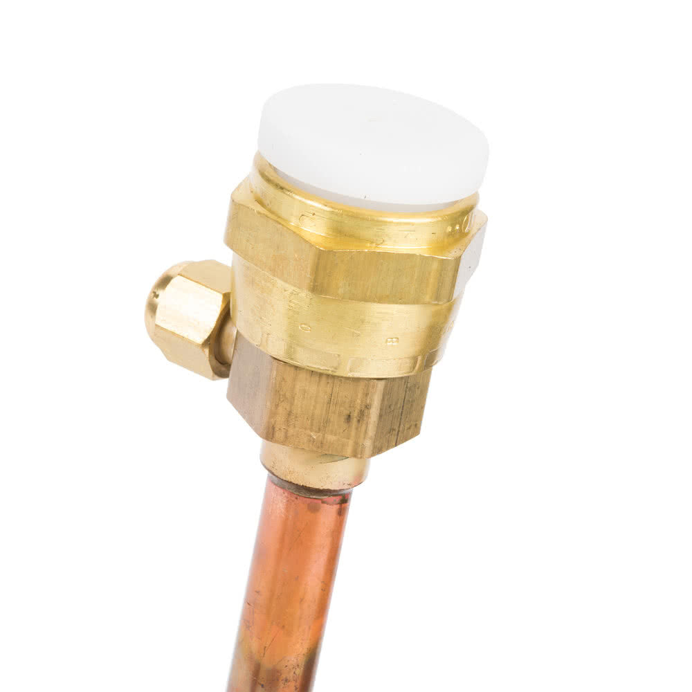 Close-up of an automatic air vent valve with a brass hexagonal body, a white plastic cap on top, and a copper pipe attached at the bottom, ideal for use with Manitowoc systems or in setups utilizing 50 ft tubing to release trapped air.