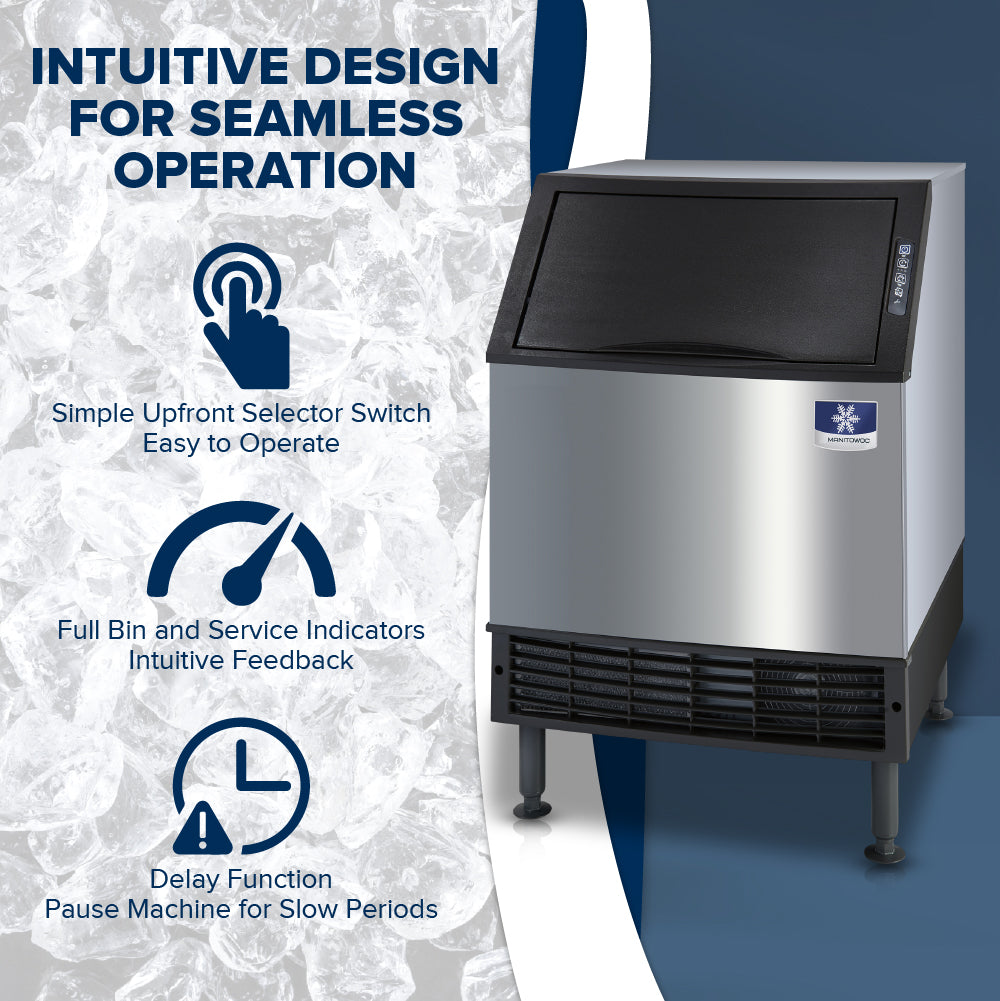 A Manitowoc ice maker with a black lid and stainless steel body sits atop a bed of ice cubes. Blue icons and text highlight features: simple selector switch, full bin/service indicators, and a delay function. This air-cooled ice machine is perfect for busy spaces.