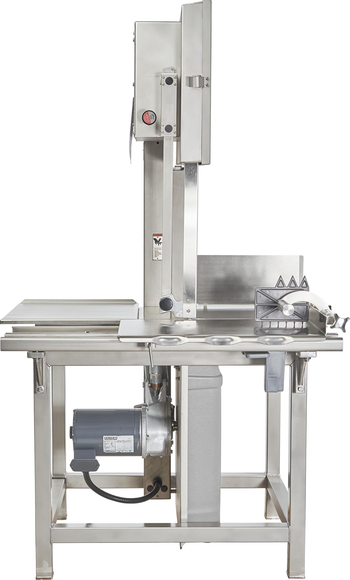 A Hobart 6801-18IP stainless steel commercial meat bandsaw stands on four legs, with a large cut table, vertical blade housing, integrated pusher, motor underneath, safety guard, and slicing guides—efficient for cutting large portions of meat.