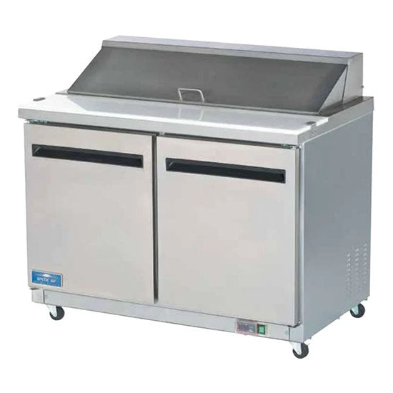 A commercial stainless steel Arctic Air AST48R sandwich prep table with two doors, a smooth white countertop, a raised covered section for ingredients, and small wheels for mobility. The unit looks clean and sits against a plain white background.