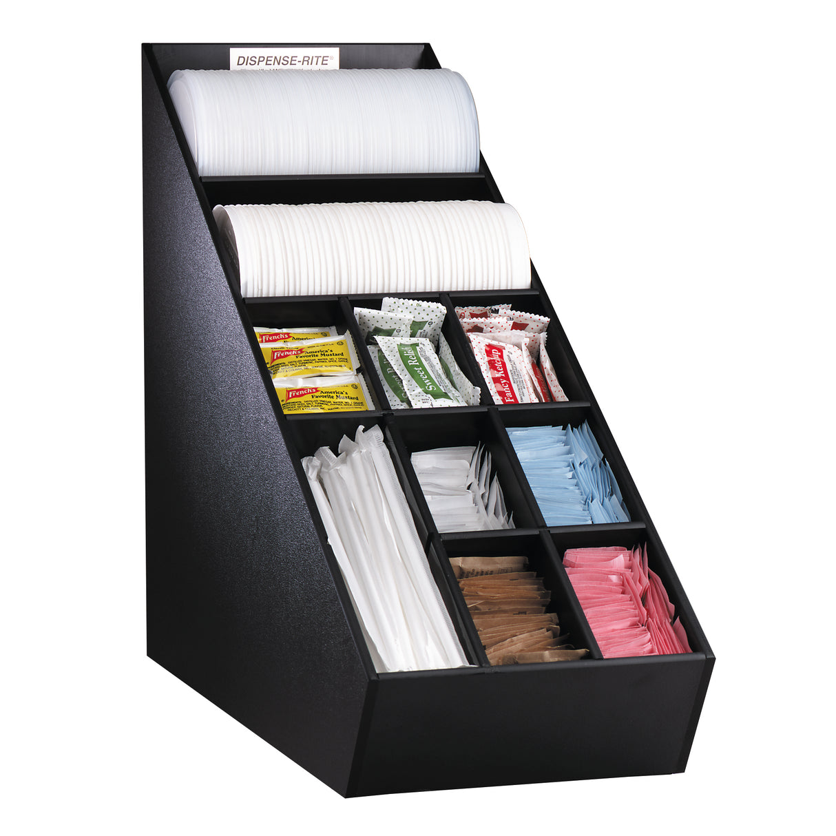 A black condiment organizer holds white napkins, disposable cups, and nine compartments filled with straw wrappers, sugar packets, sweetener packets, and blue stirring sticks—all neatly arranged for convenient self-service use.