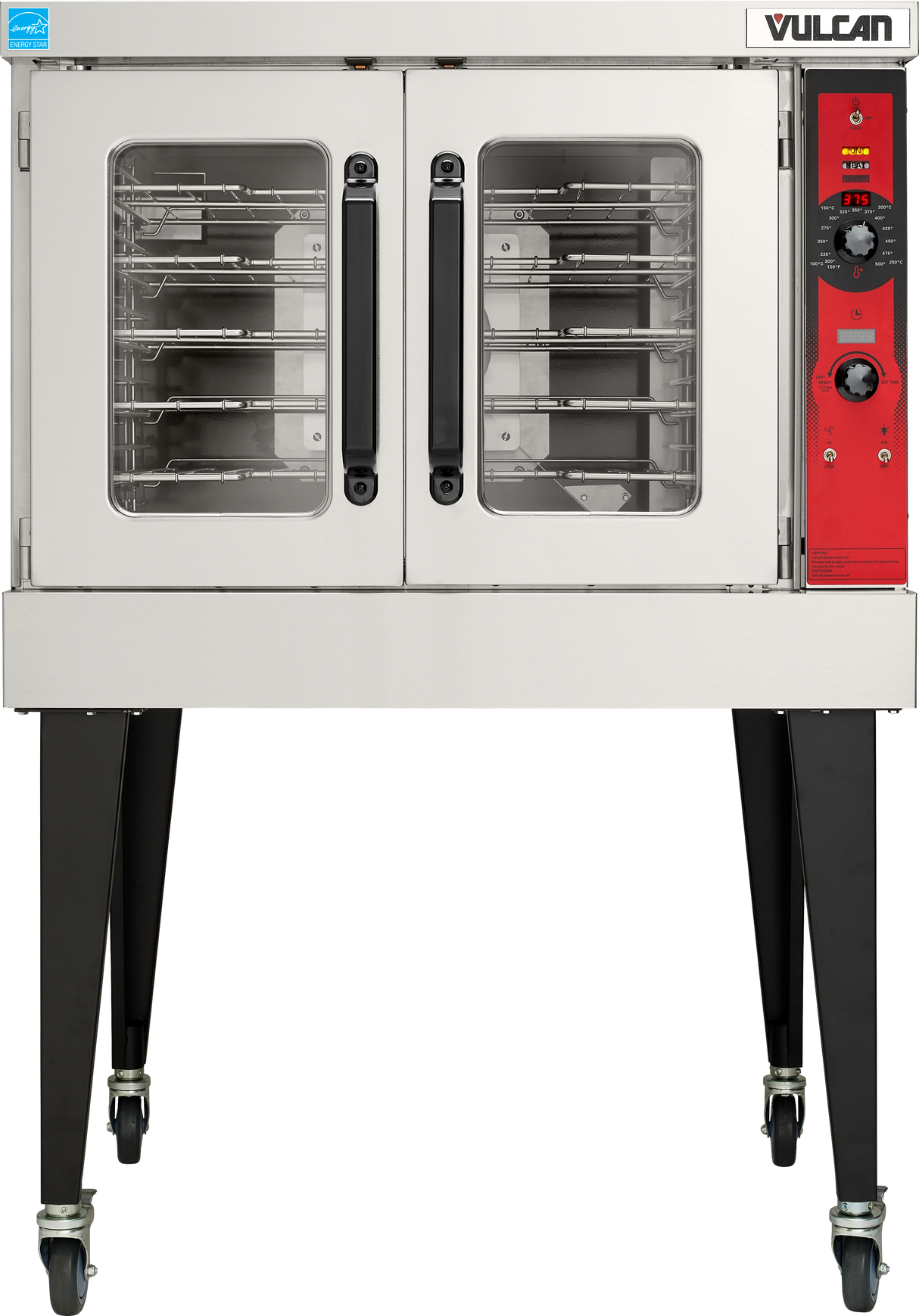 A large, stainless steel Vulcan VC5GD convection oven stands on four black legs with wheels. The oven has two glass doors with black handles, revealing metal racks inside. The right side features a red control panel with dials and indicator lights.