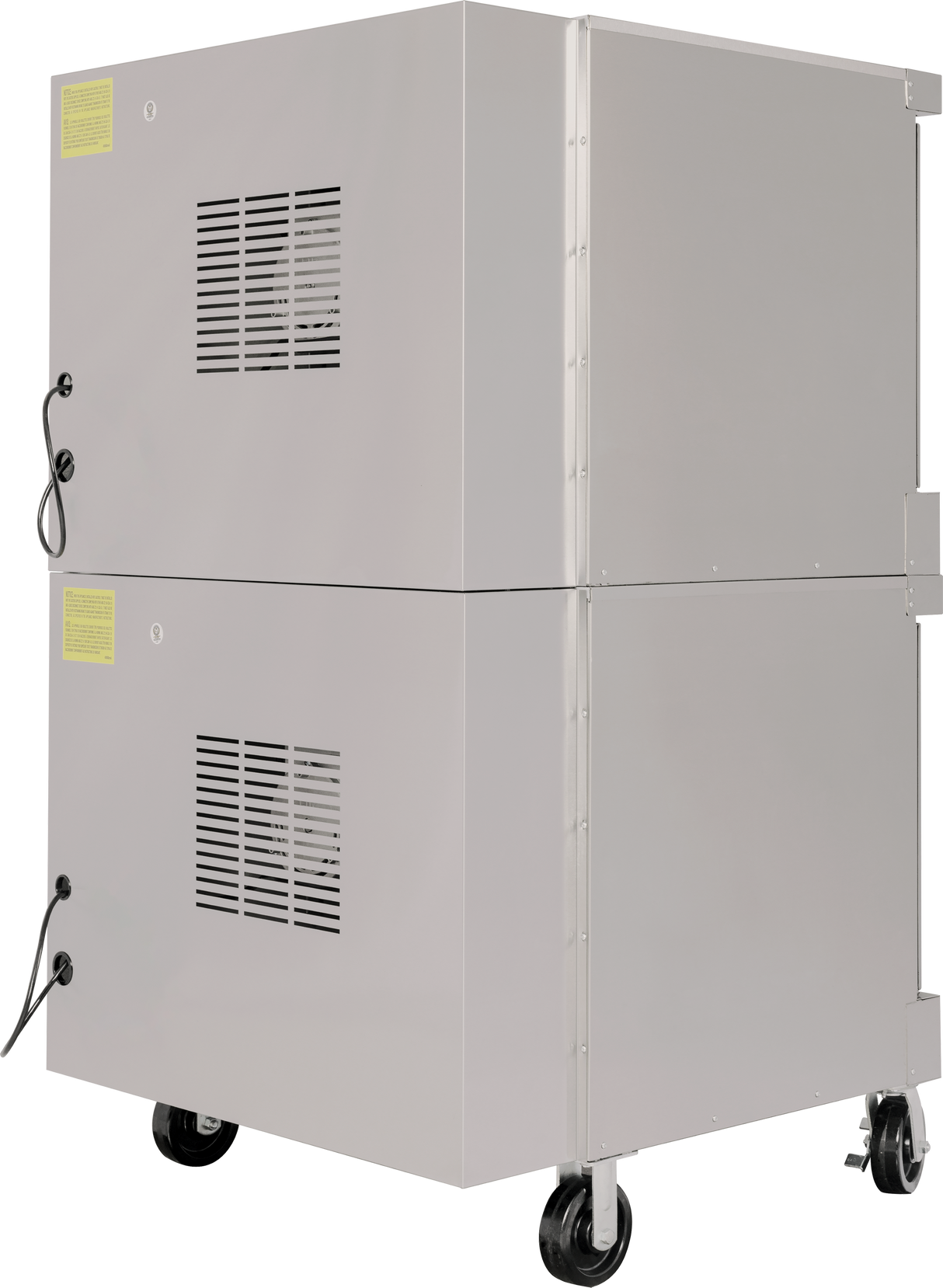 A large, industrial, double-deck metal air filtration unit with two stacked sections, vent grilles, and power cords sits on four black caster wheels for mobility. The unit is light gray with yellow caution labels on the sides.