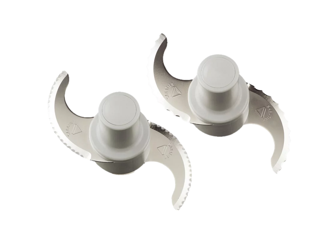 Two metal food processor blades with curved, sharp edges are shown on a white background. Compatible with the Robot Coupe R301 Dice Combination Food Processor, each blade features a central white plastic hub and either smooth or serrated edges.