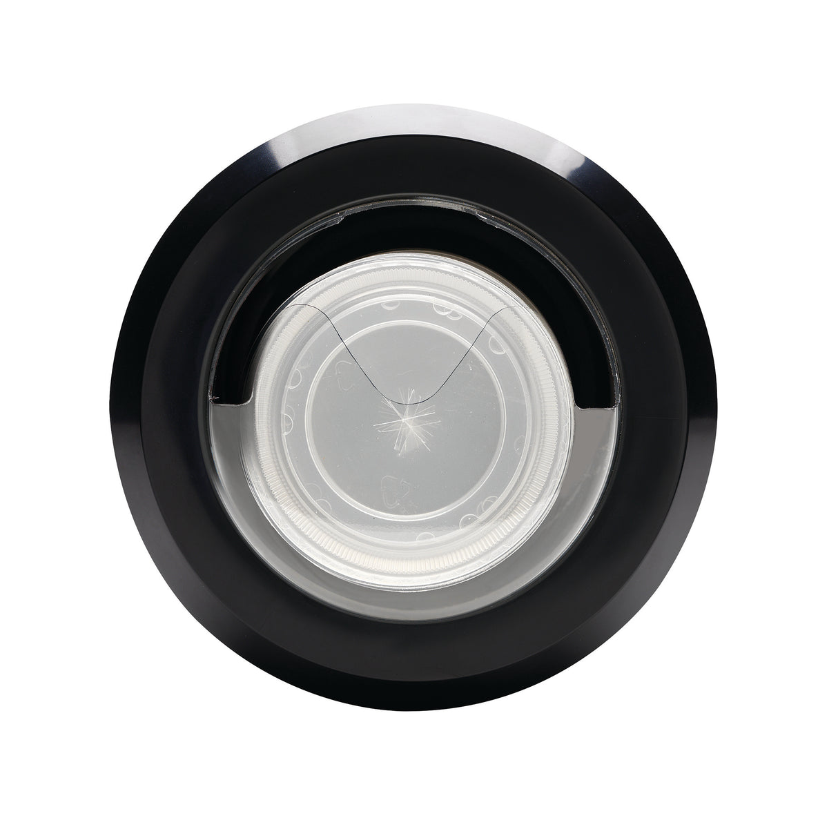 A top-down view of a black circular cold beverage lid with a transparent center, featuring a subtle star-shaped pattern and thin, faint cracks. The object appears to be designed for in-counter lid dispensing, likely made of plastic or glass.