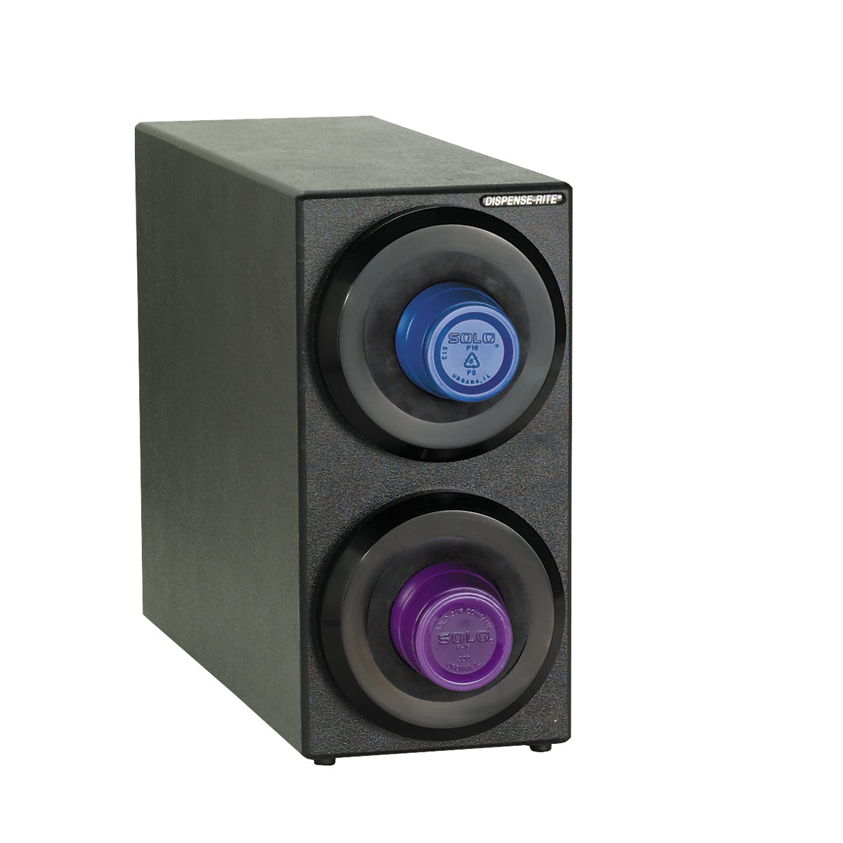 A black rectangular dispenser, NSF certified, holds two round SOLID soap cartridges—blue on top and purple below—in circular slots. “DISPENSAMATIC” appears in the upper right corner, similar in function to cup dispensers or a cup dispensing cabinet.