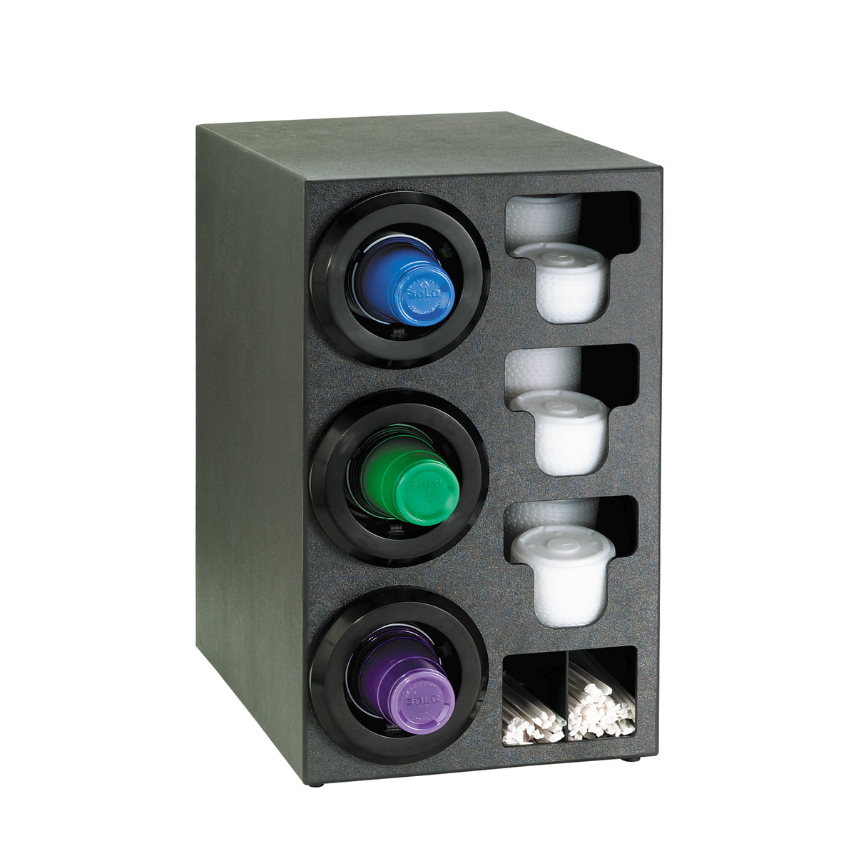 Black organizer with three circular compartments for single-serve coffee pods (blue, green, purple). Beside each pod are cylindrical white creamer containers. At the bottom, two small sections act as straw organizers for white stir sticks.