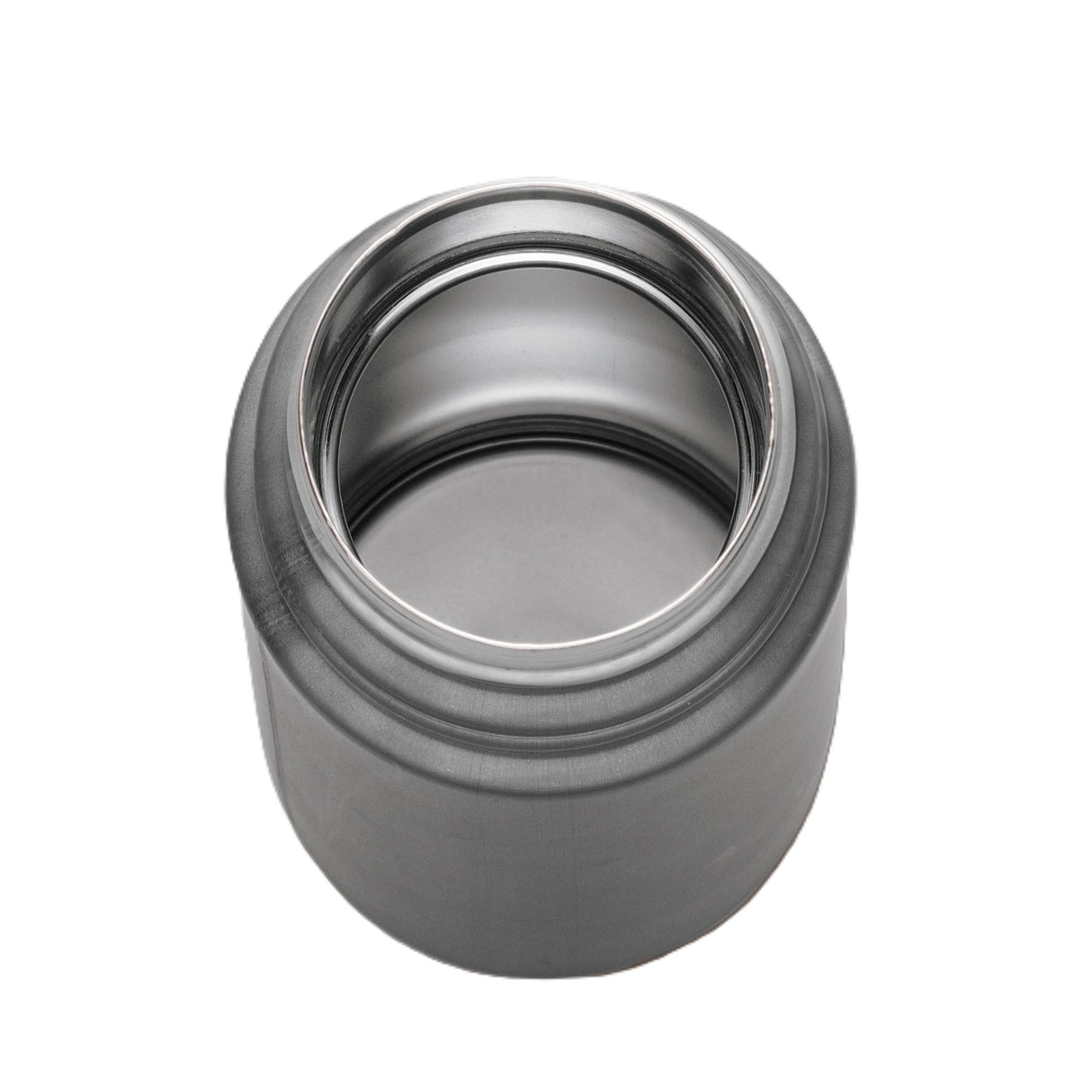A close-up view of an open, empty stainless steel bottle, possibly a food jar or vacuum insulated bottle, shown from above. The container has a wide mouth with a smooth, shiny metallic surface and is placed on a white background.