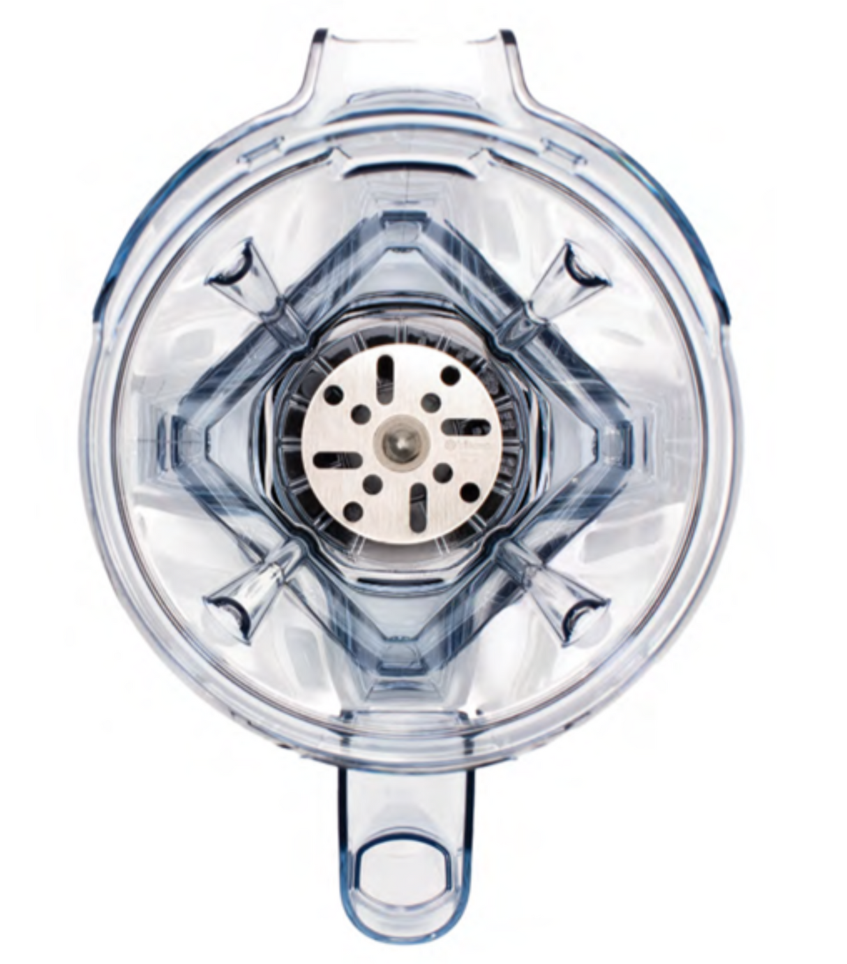 Top-down view of an empty, transparent Vitamix blender jar featuring the Aer Blend Disc Assembly with four angled blades at the base and a central metal component; handle is visible at the bottom, and the jar has a slightly blue tint.