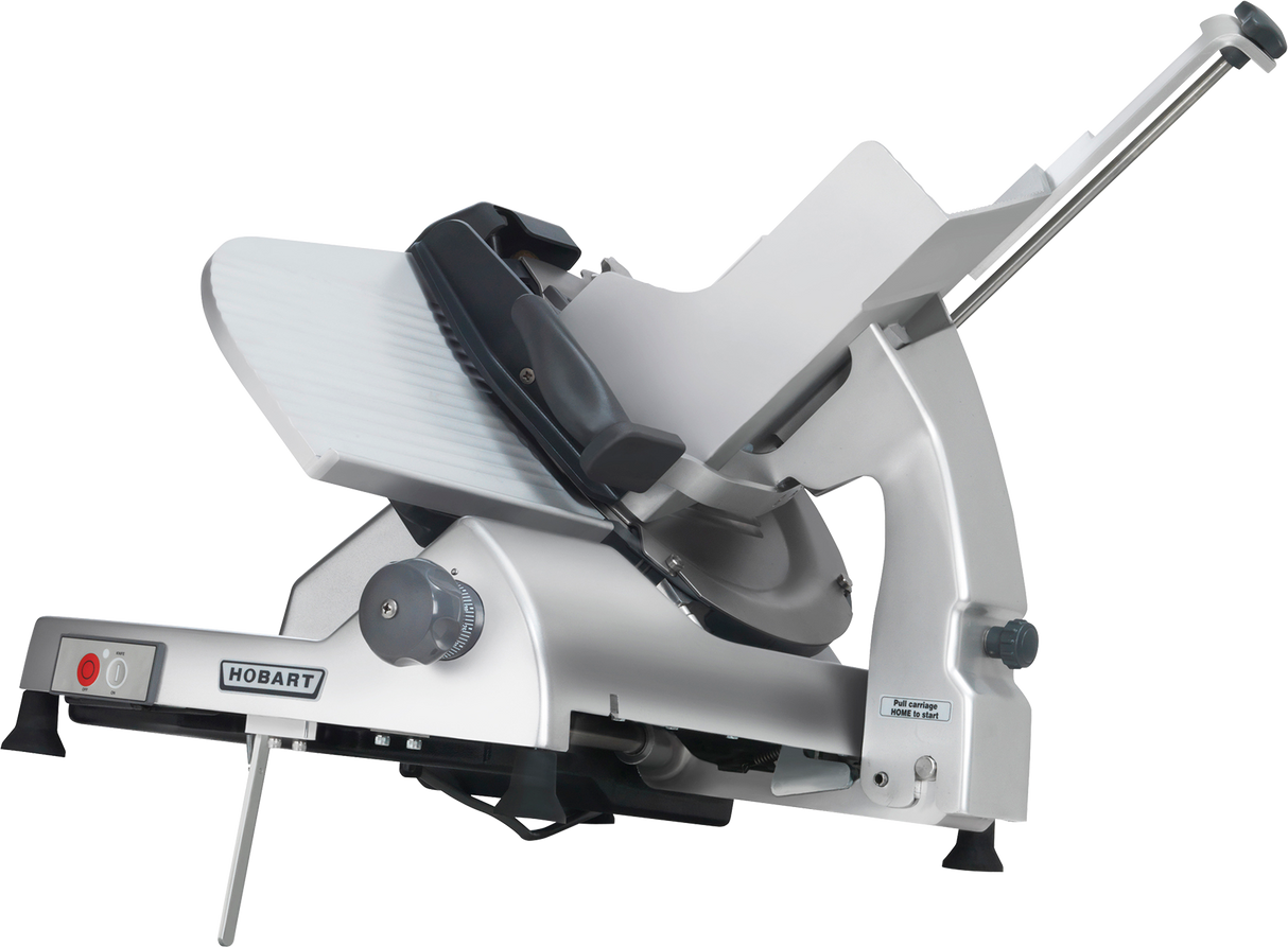A heavy duty meat slicer with a silver body, angled food carriage, black handle, and adjustment knob. The Hobart logo is on the base. Features a partially visible removable knife for efficient slicing in professional kitchens.