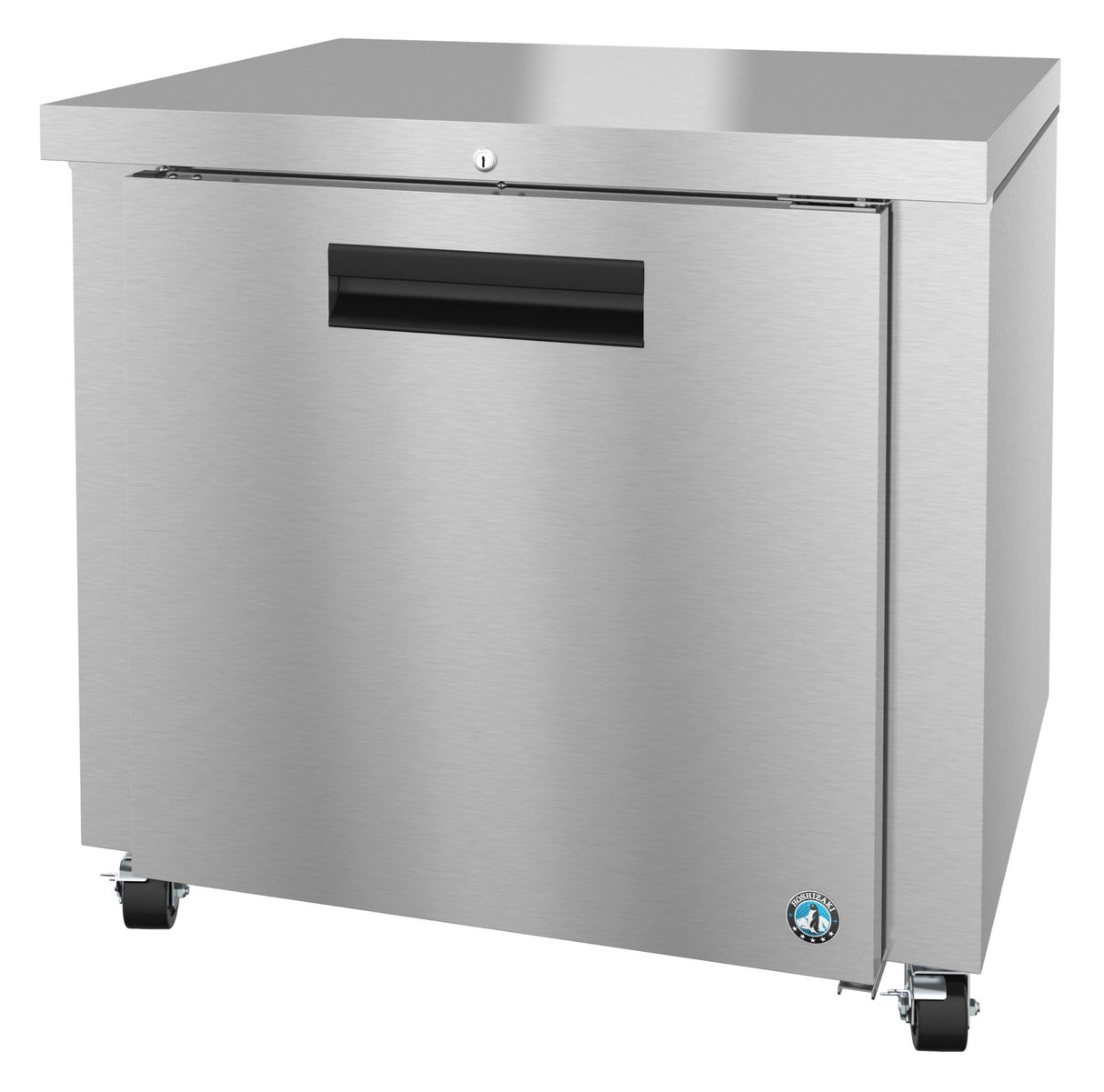 A stainless steel undercounter refrigerator on wheels, featuring a single front door with a recessed black handle, a lock above the handle, and a small blue logo in the lower right corner. The surface has a brushed metal finish.