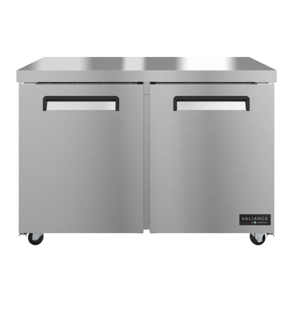 A double-door commercial stainless steel refrigerator or undercounter freezer on wheels, featuring a smooth metallic finish, recessed handles, and the Valiance brand logo in the bottom right corner. The appliance is ENERGY STAR certified and sits on four small caster wheels.