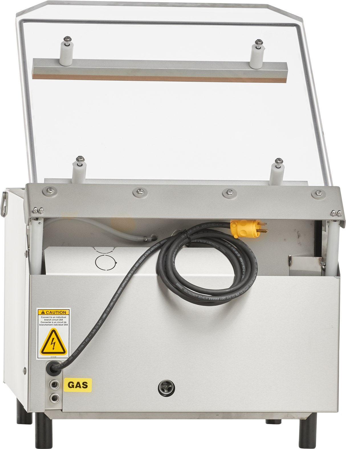 A stainless steel single chamber Vacuum Packaging Machine with a transparent hinged lid open upright. A thick black power cord with a yellow plug is coiled at the front, and gas flush and electric shock warning labels are visible on the lower left side.