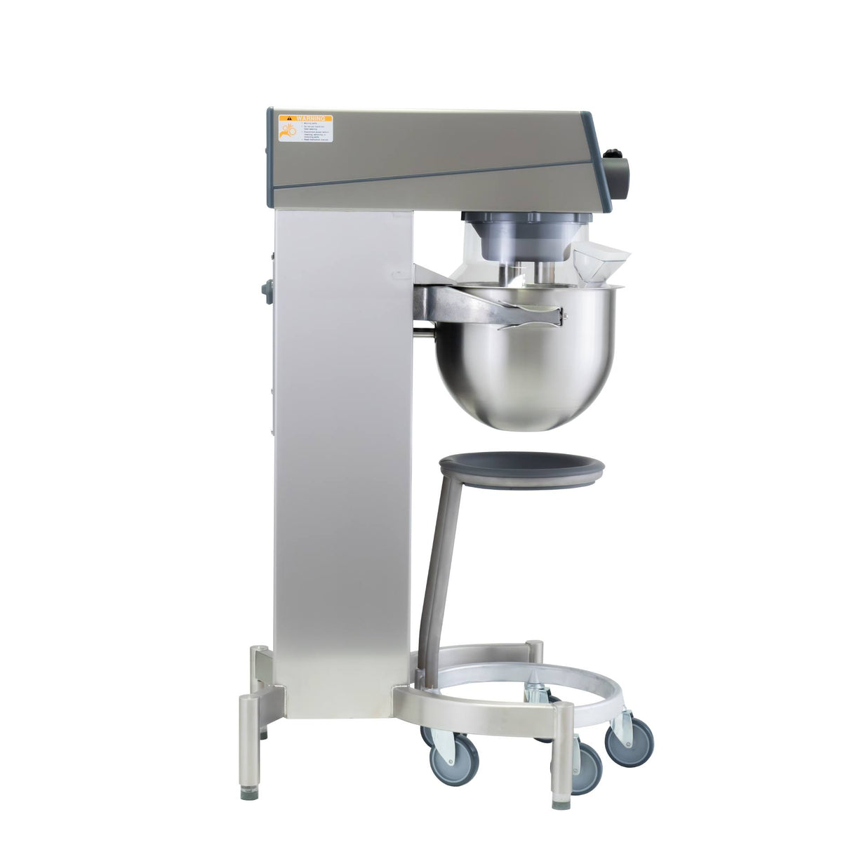 A large Varimixer KODIAK 20 qt. food mixer with a stainless steel bowl sits on a wheeled base. The tall, metallic machine has a protective cover above the bowl and a black adjustment knob on the side, set against a plain white background.