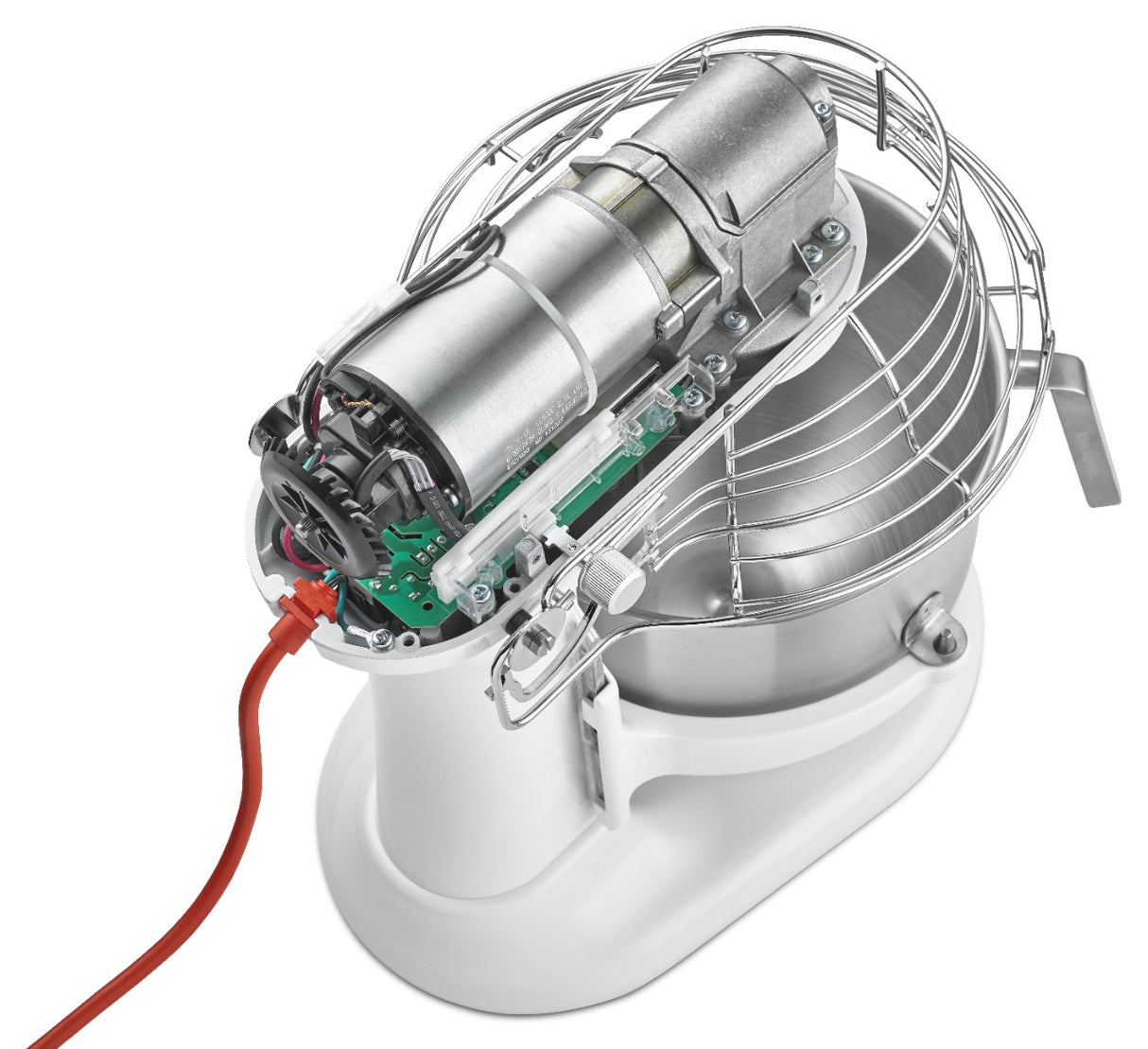 A KitchenAid Commercial Stand Mixer with its top half open reveals an exposed motor, circuit board, wiring, and gears. The 8 quart bowl and wire whisk attachment are below; the device has a red power cord and sits on a white base.