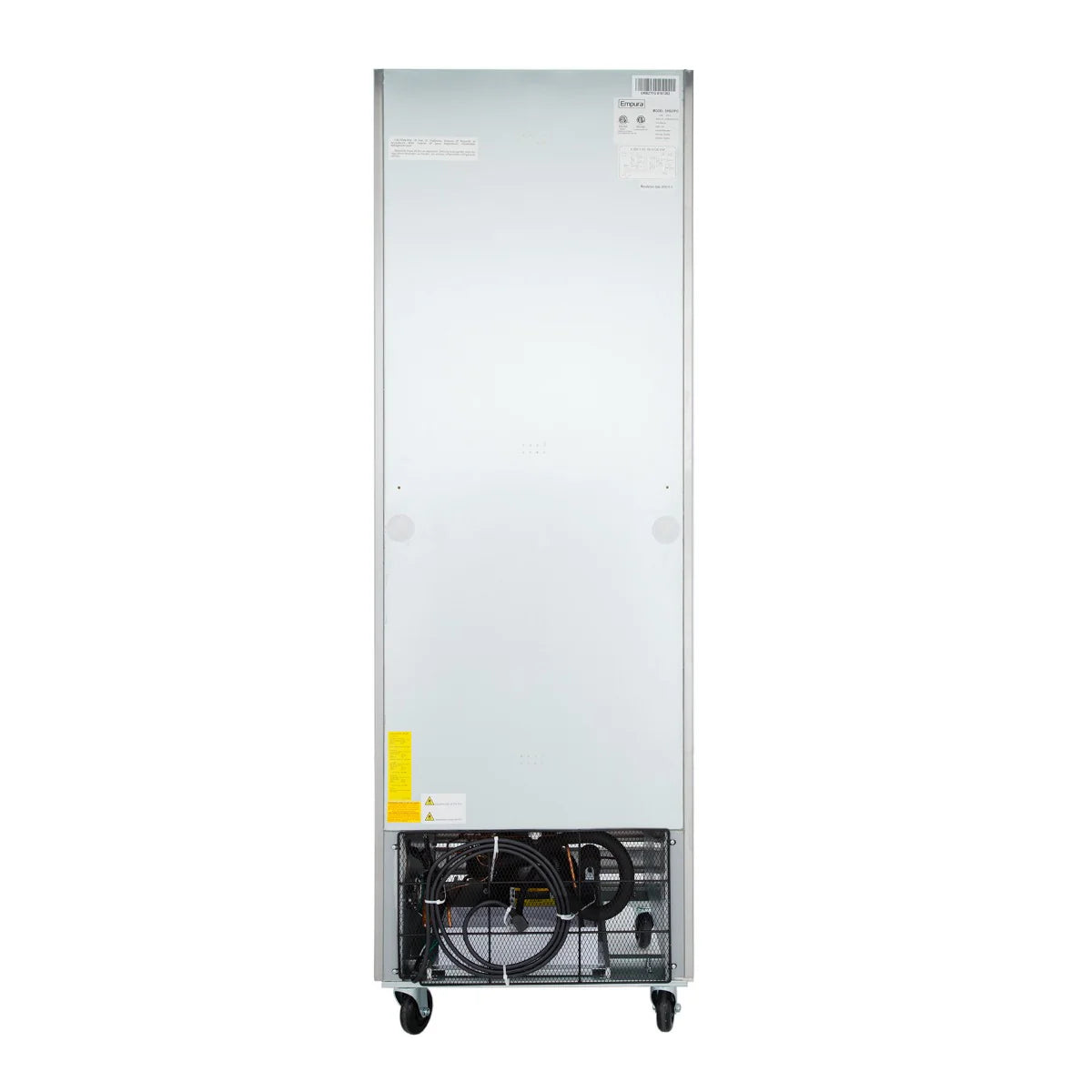 The image shows the back view of a tall, upright commercial freezer, with a smooth metallic panel, visible compressor and wiring at the bottom, and small wheels for mobility. Labels and warning stickers are attached near the top and bottom.