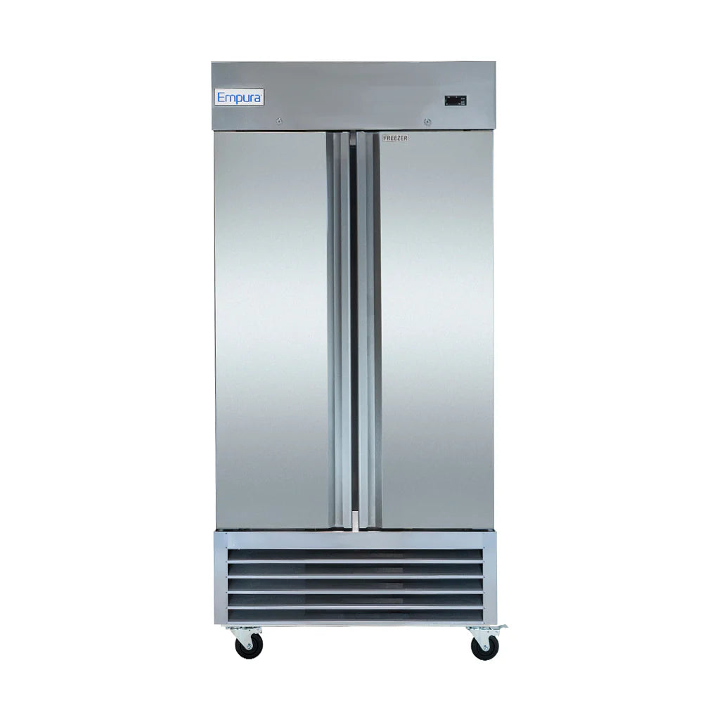 A commercial stainless steel Reach-In Freezer by Empura features double doors, vertical handles, a vented lower front panel, and smooth reflective surfaces. It sits on four caster wheels for easy mobility and has minimal detailing for a sleek look.