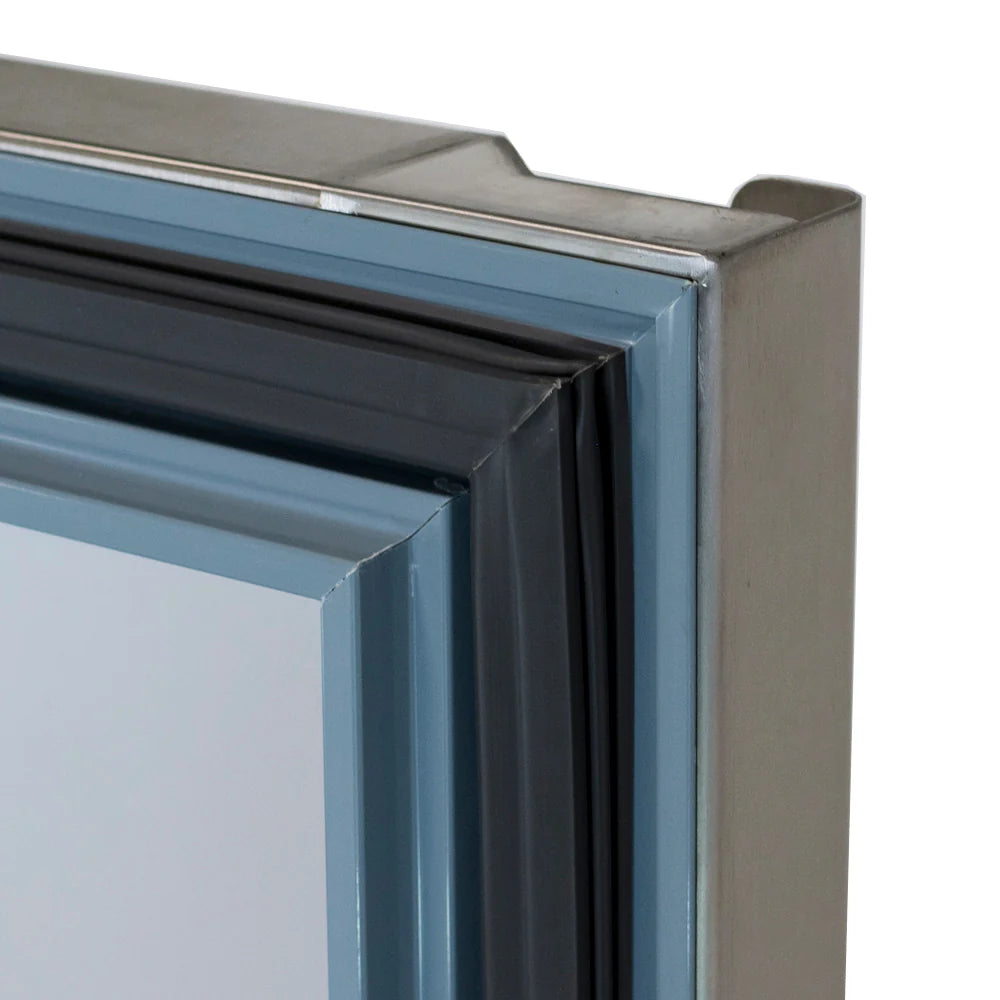 Close-up of a Reach-In Freezer door seal, featuring a thick, flexible rubber gasket in gray and blue tones tightly fitted around the stainless steel freezer door for an airtight closure. The corner and reflective surfaces are clearly visible.