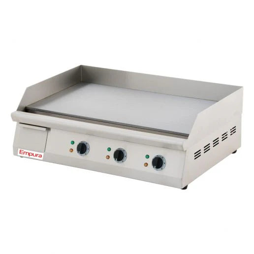 A stainless steel commercial griddle with three control knobs, indicator lights, raised side and back splashes, and a flat cooking surface. The Empura name is visible on the front left side. This countertop electric griddle is designed for easy use.