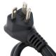 Close-up of a black, three-prong electrical power plug with metal prongs facing upward and the cord coiled below. The plain white background highlights its details—ideal for powering an electric countertop griddle or stainless steel griddle.