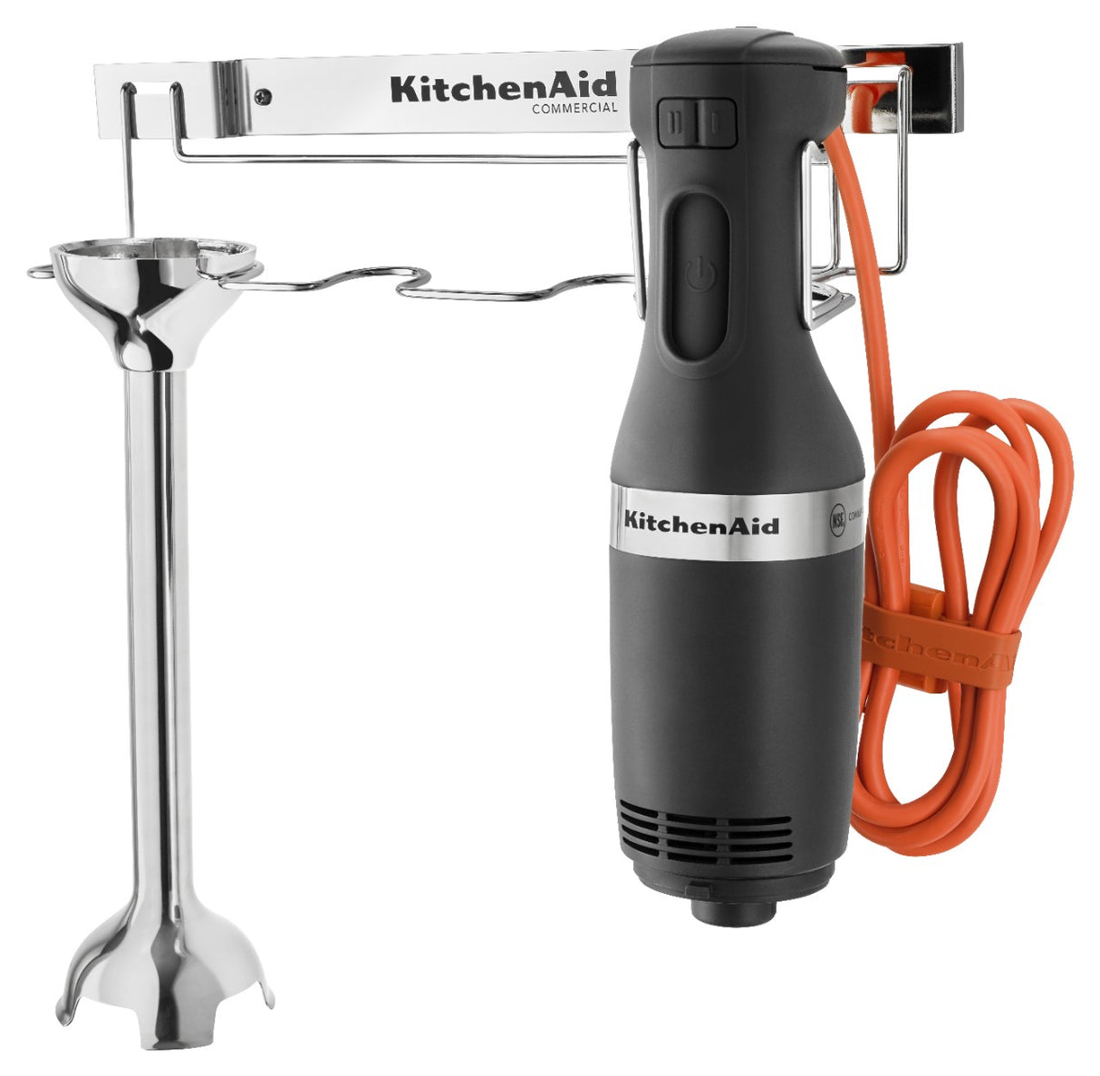 A black and silver KitchenAid commercial immersion blender with a 12 stainless steel blending arm is mounted on a metal wall rack. An orange power cord is neatly coiled and secured on the right side of this heavy duty immersion blender.