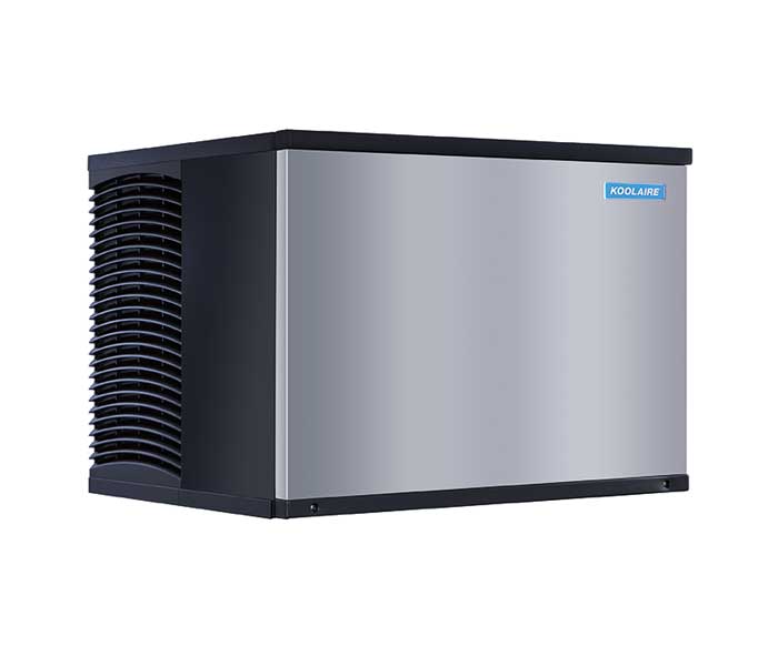 A rectangular, stainless steel air-cooled ice machine with black accents. The left side has a vented grille for airflow, and the right front displays a small blue KOOLAIRE logo. This Ice Kube Machine produces clear half-dice ice cubes.