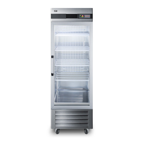 A commercial stainless steel refrigerator with a glass door, displaying five empty white wire shelves. This commercial refrigerator stands on four wheels and features a digital control panel at the top right corner above the door.