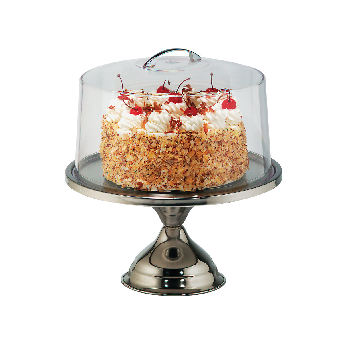 A round cake covered in whipped cream, chopped nuts, and cherries sits on a cake stand with a stainless steel base and a clear plastic cover with a handle, displayed against a plain white background.