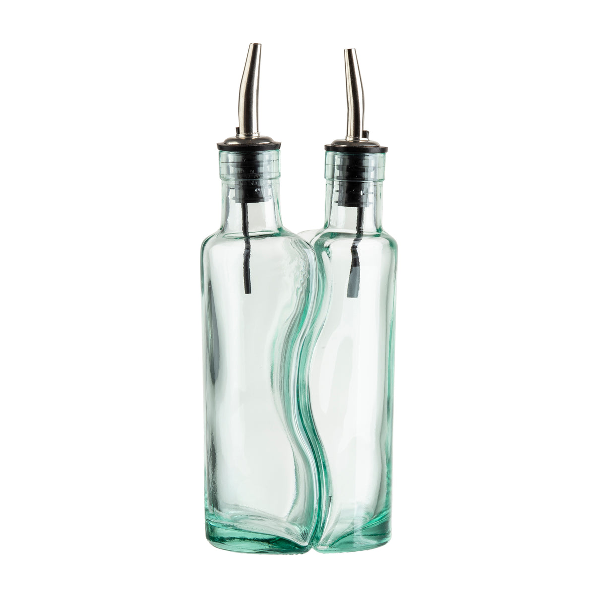 Two clear glass oil and vinegar bottles are fused together side by side, each with stainless steel pourers and black rubber stoppers. The slightly wavy glass bottles are empty, standing upright against a white background.